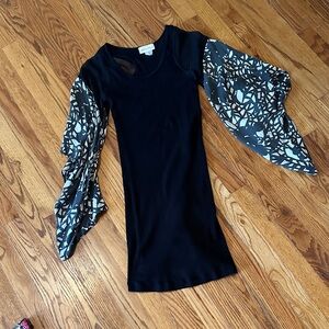 Elegant Black Top with Patterned Sleeves
